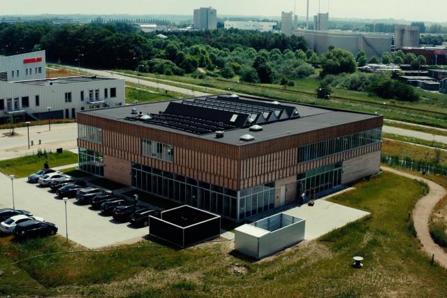 Helix Lab with industry in the background